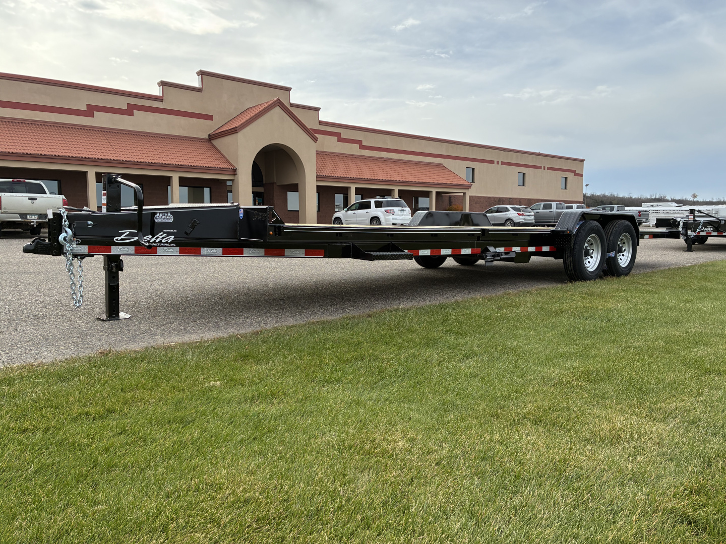 New 2026 Delta 27TB Bumper Pull Tilt 24' Flatbed Trailer