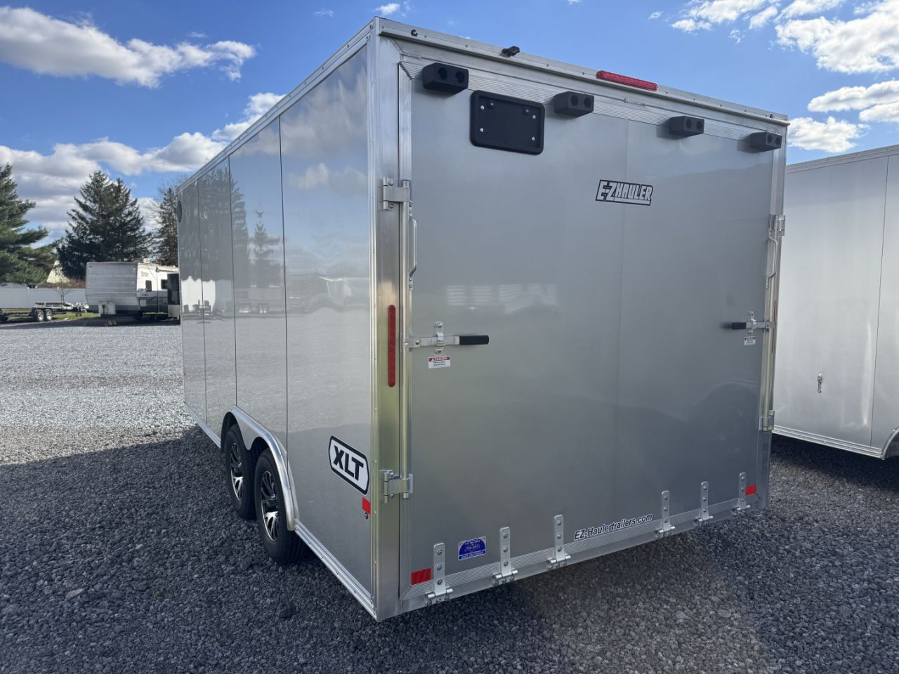 New 2026 E-Z Hauler EZEC8.5x16CH XLT PRO Car Hauler 6 FOOT 10 INCH INTERIOR HEIGHT FREE ALUMINUM WHEEL UPGRADE SALE ON NOW