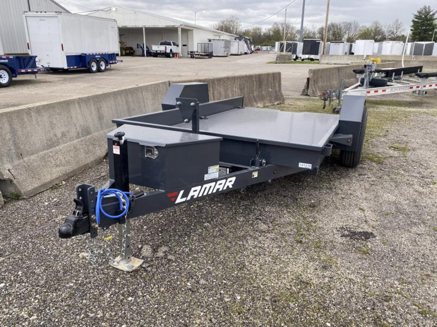 New 2025 Lamar Trailers 6 FT 6 IN X 12 FT TILT TRAILER STEEL DECK 7K GVWR