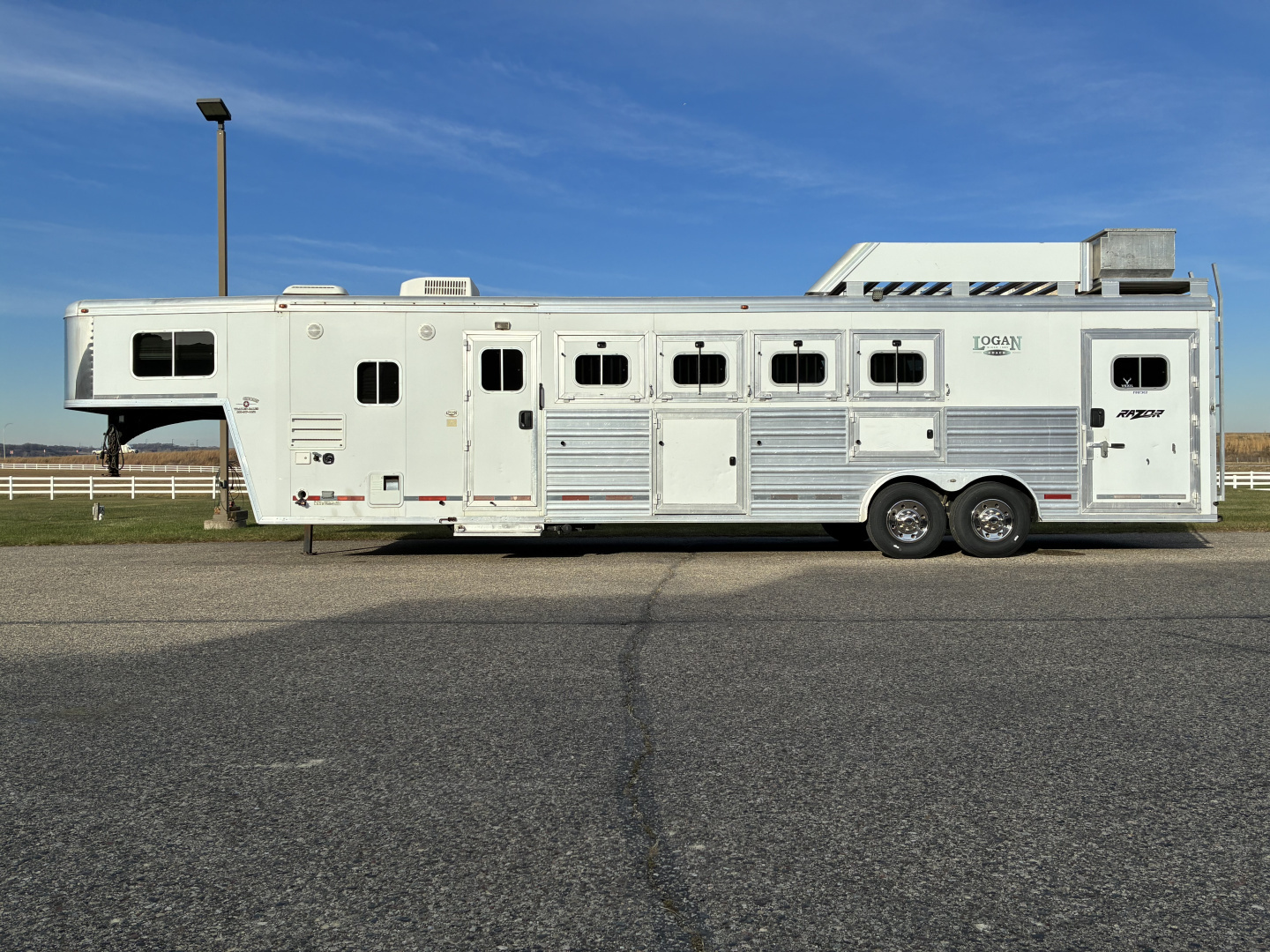 Used 2013 Logan Coach 4H LQ Horse Trailer