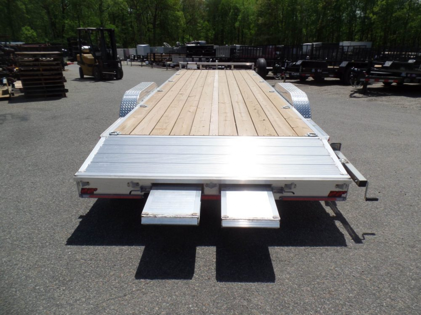 New EXAMPLE / WOLVERINE BRAND, 22 ft. long deck open car trailer, 82 wide deck, 9,990 lb. GVWR. ALUMINUM FRAME, Wood Deck. Our ID# 056786
