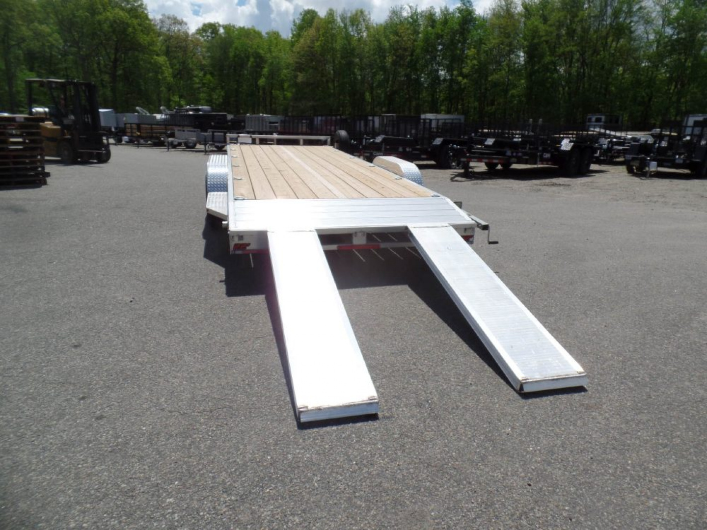 New EXAMPLE / WOLVERINE BRAND, 22 ft. long deck open car trailer, 82 wide deck, 9,990 lb. GVWR. ALUMINUM FRAME, Wood Deck. Our ID# 056786