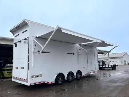 New 2026 Haulmark 28 FT EDGE ALUMINUM STACKER TRAILER W/ ESCAPE DOOR AND AWNINGS