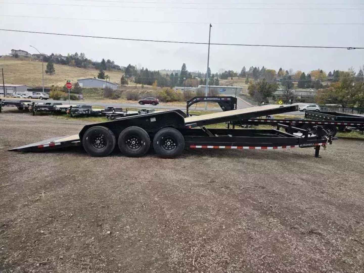 New 2026 Iron Bull 83x24 21k Tilt Deck Trailer