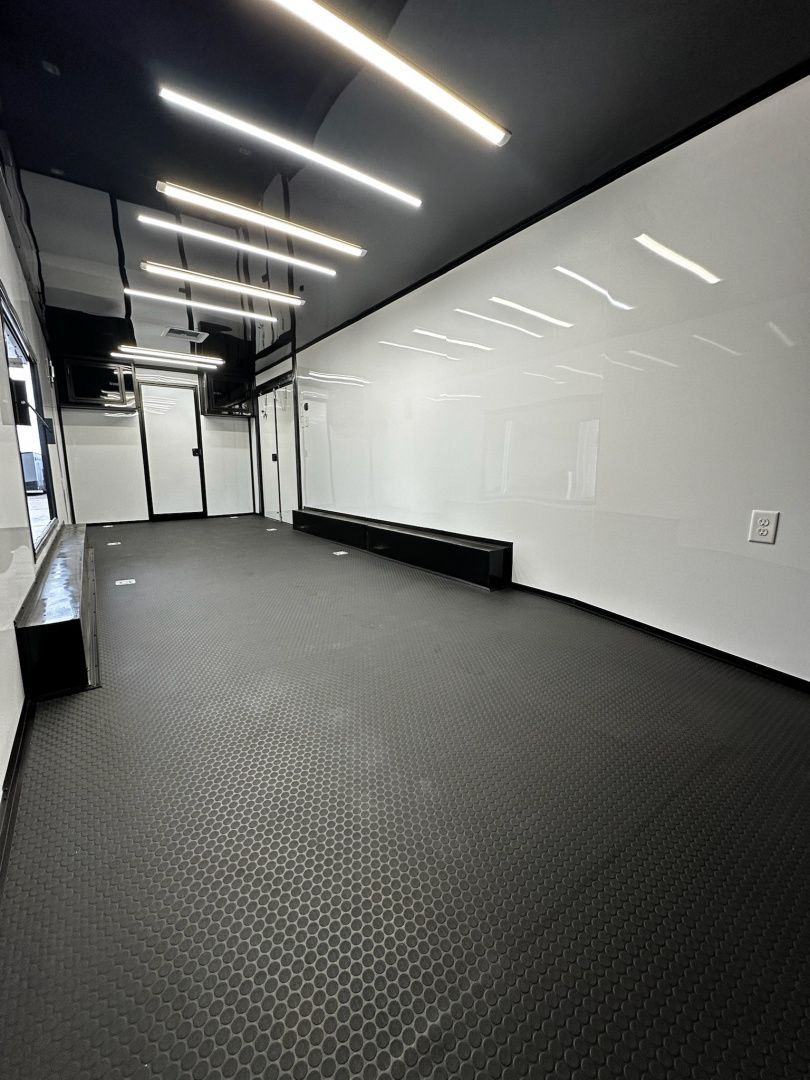 New 2027 8.5x32 7'6" Interior -Race/Bathroom Trailer- Finished Interior-5200lb Triple Torsion-Awning-Escape Door