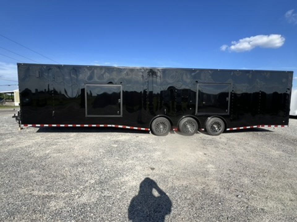 New 2027 Rock Solid Cargo 8.5x36 Triple Axle Enclosed Car Hauler – Black PolyCore