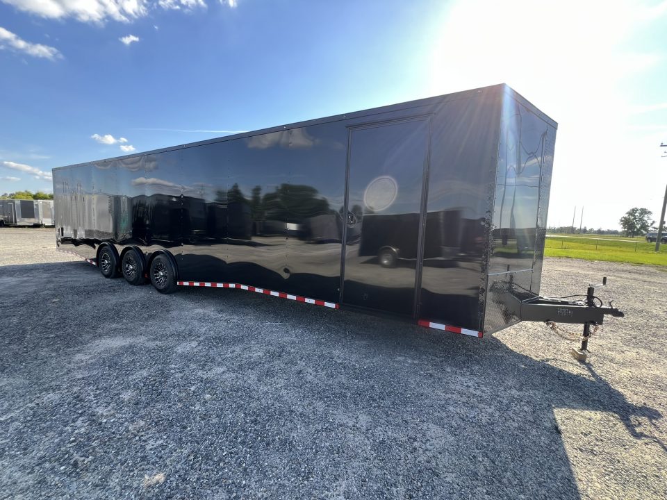 New 2027 Rock Solid Cargo 8.5x36 Triple Axle Enclosed Car Hauler – Black PolyCore