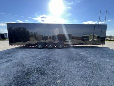 New 2027 Rock Solid Cargo 8.5x36 Triple Axle Enclosed Car Hauler – Black PolyCore