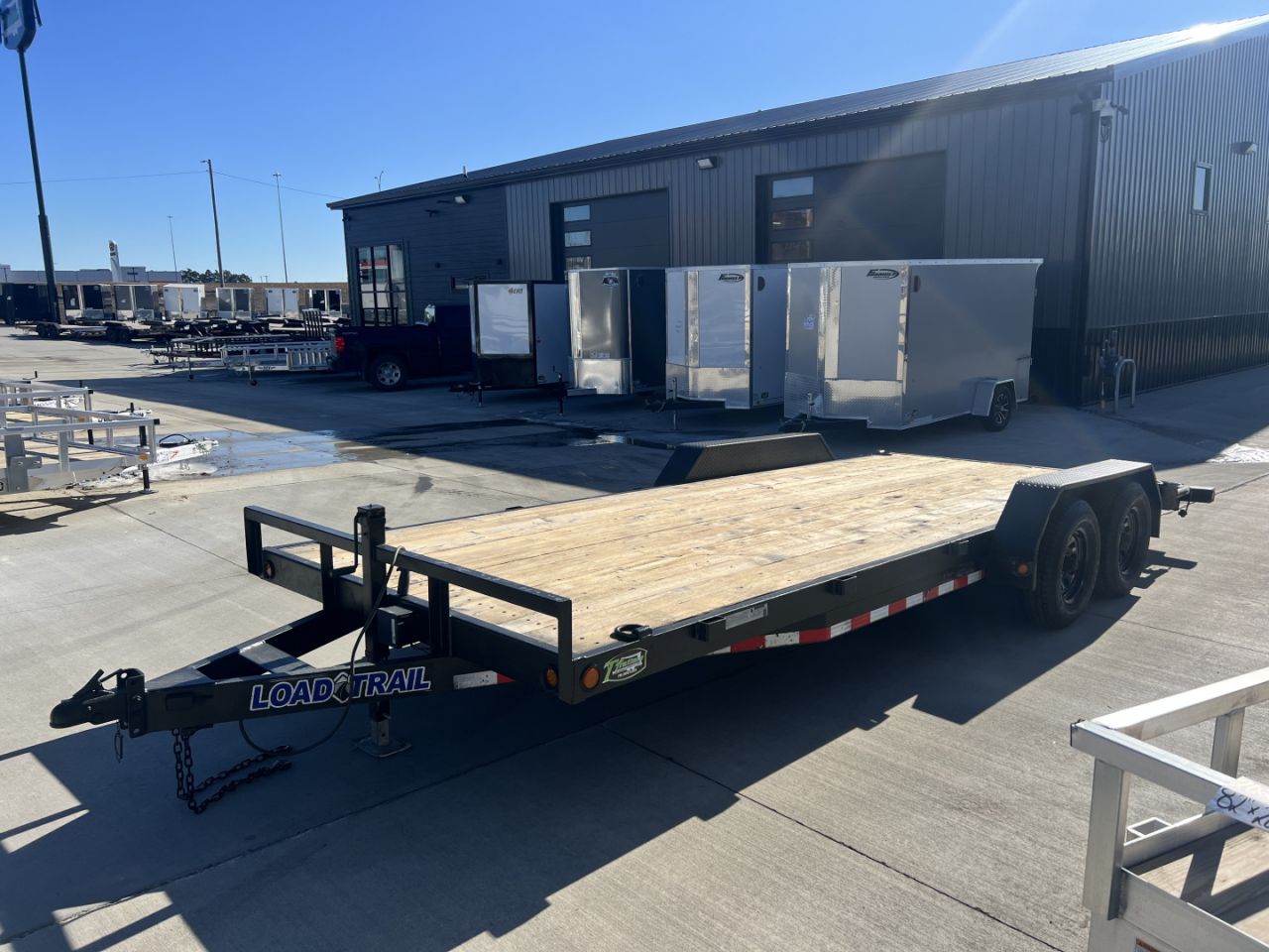 Used 2021 Load Trail 20’ flatbed Trailer 2-5200 lb axles=10K, dovetail, removable fenders, Slide In Ramps