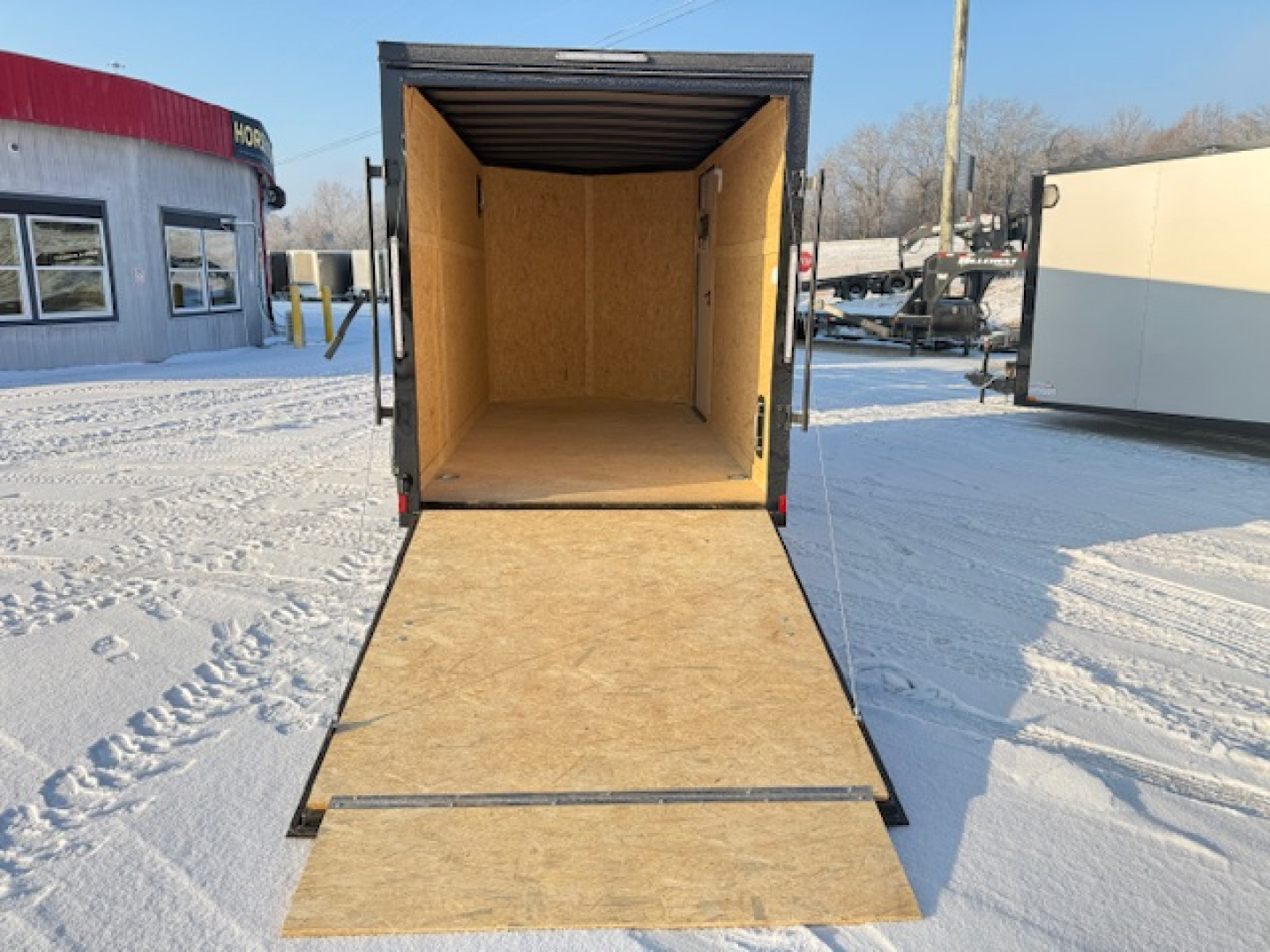 New 2026 Outlaw Trailers 6x12 SA Cargo / Enclosed Trailer