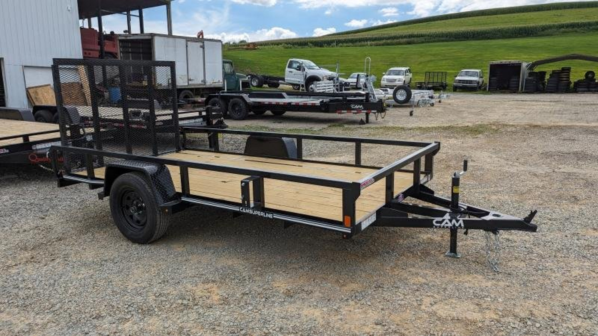 New 2026 CAM SUPERLINE 7x12 Tubular Top Rail Utility Trailer w/ Spring Assist Gate