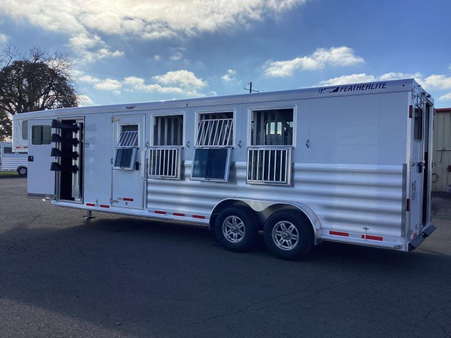 New BELOW COST! 2024 Featherlite 9600-7472 4 Horse Trailer-Swing Out Saddle Rack-Stud Divider-Screen Door-Easy Care Flooring