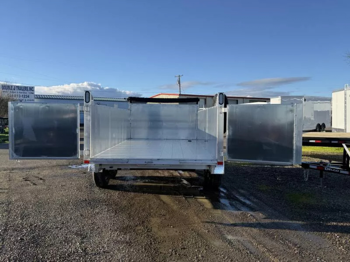 New 2026 Mission 7x14' Dump Trailer, 36" Tall Sides, 2-7k Leaf Spring Braked Axles, Spare Tire